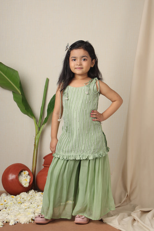 Mukta Embroidered Tie Up Straps Kurti And Flared Palazzo