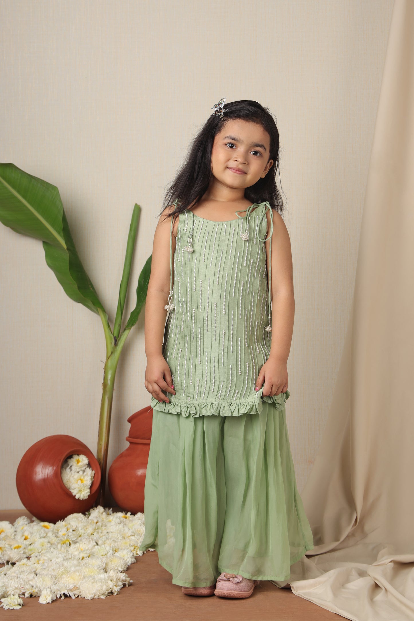 Mukta Embroidered Tie Up Straps Kurti And Flared Palazzo