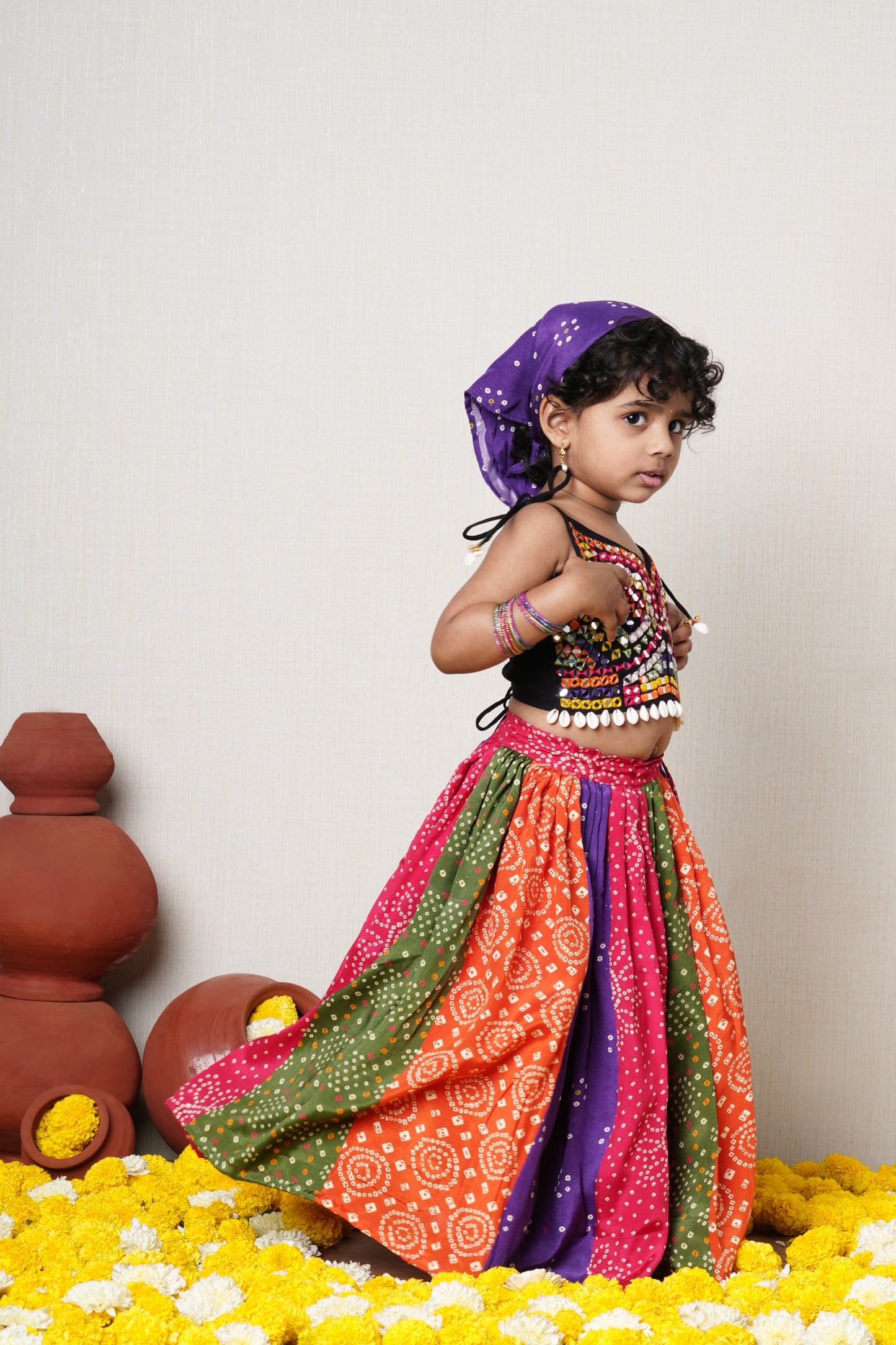 Black strappy top with multicolour thread and mirror hand embroidery